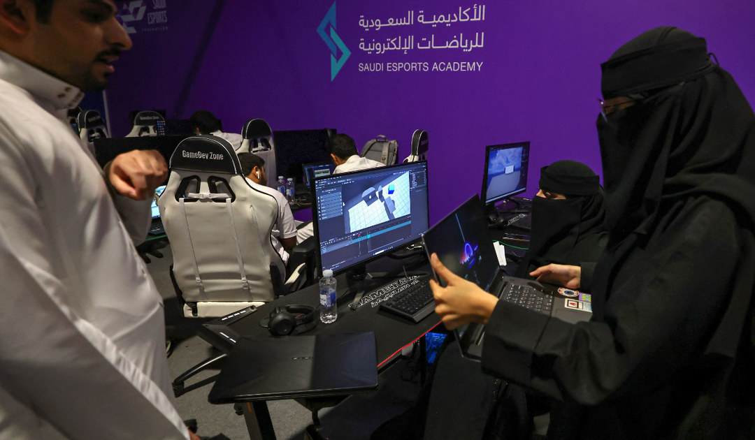 Saudi trainees attend a training course at the Saudi Esport Academy in Riyadh on August 29, 2023. (AFP)