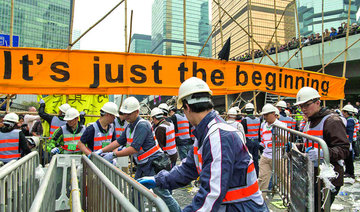 HK police haul away protesters from rally site