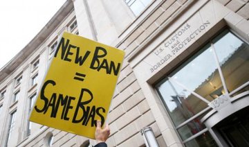 Revised Trump travel ban gets first legal blow