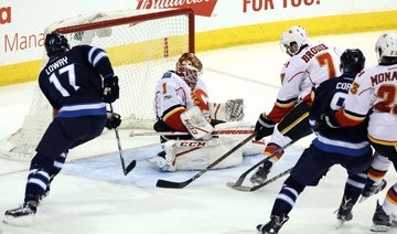 Flames shutout Jets; Senators defeat Avalanche