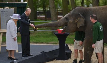 Trumpet voluntary: Watch as Queen Elizabeth feeds an ‘excited’ elephant