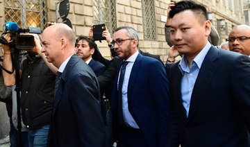 End of Berlusconi era as Chinese group buys AC Milan