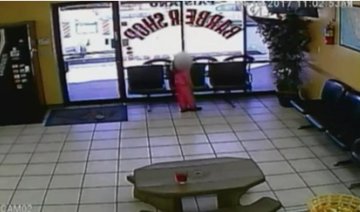 Footage shows moment US girl narrowly avoids bullets in mall shooting