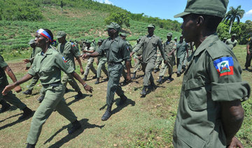 Haiti revives army, raising fears of political crackdown