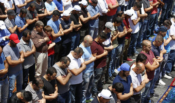 Peaceful prayers at Jerusalem holy site, West Bank violence