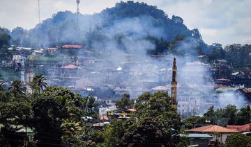 Philippine army says taking fire from women, children in Marawi battle