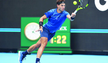 Nadal defies ‘tennis ball hair’ mishap to sweep into Beijing semis