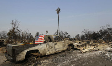 Deadly California wildfires flare up and swallow more homes