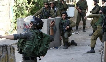 Israel arrests 51 Palestinians in east Jerusalem raid