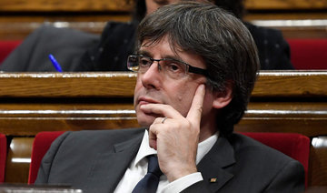 Catalonia’s axed leader ‘in Brussels’