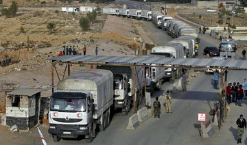 Aid for 40,000 enters besieged rebel area near Damascus