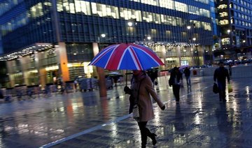 UK economy picks up speed, PMI survey shows