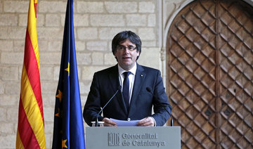 Ex-Catalan leader, freed in Belgium, blasts Spain