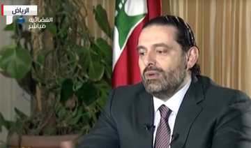 Hariri says Iran to blame for Lebanon crisis, promises to return to his country 'very soon'