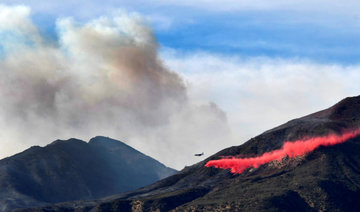 Firefighters race to contain California wildfires as winds set to strengthen