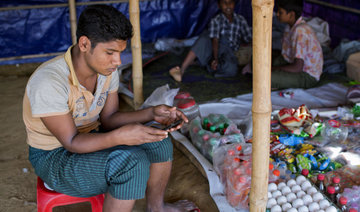 Heartbroken Rohingya refugees return home to Myanmar, even if only in videos