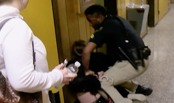 Louisiana teacher handcuffed, removed from school board meeting