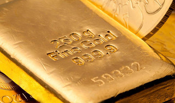 Gold dips, heads for second weekly loss