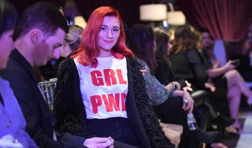 #MeToo fashion show opens with angel wing models, pig-faced men