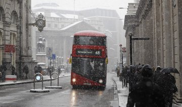 Europe weather: UK army sent out; Dutch ice skate on canals