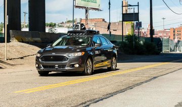 Uber self-driving tests halted after pedestrian dies in Arizona