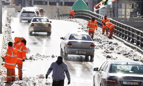 Amman cleaners to bin orange jumpsuits