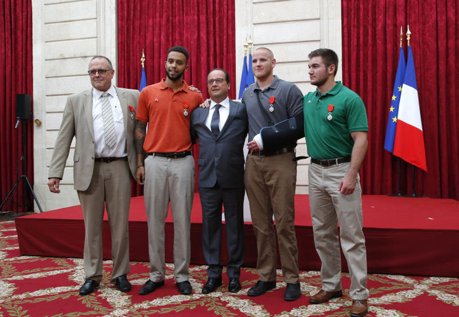 France honors bravehearts who thwarted train attack