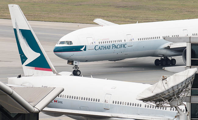 Cathay pledges to slash staff costs