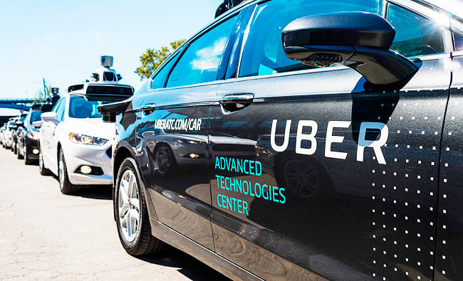 Uber grounds self-driving cars after accident