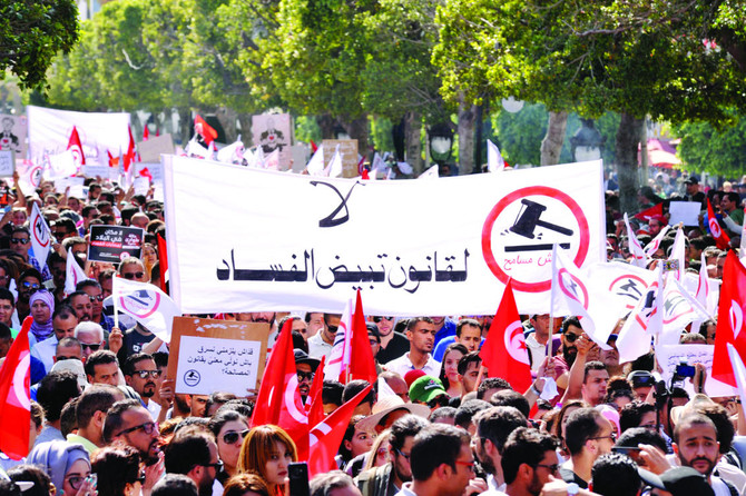 Tunisians protest over corruption amnesty bill