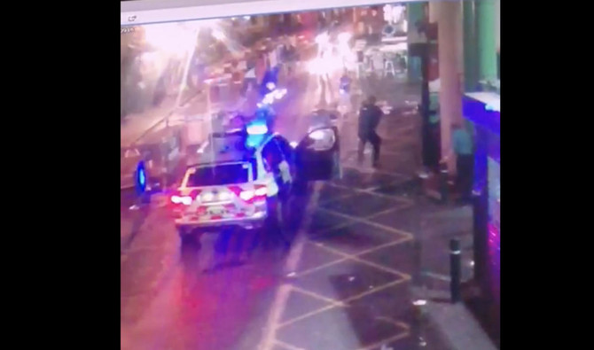 UK arrests three as footage of London Bridge attack appears online