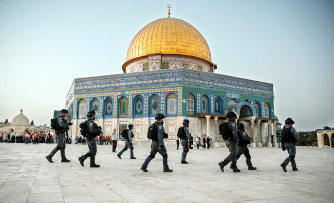 Palestinians flock back to Al-Aqsa Mosque