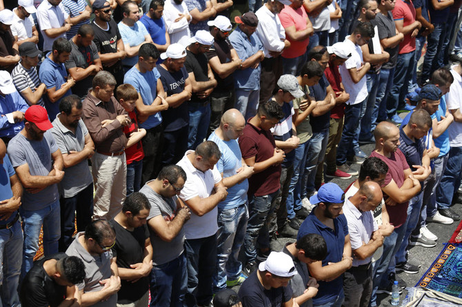 Peaceful prayers at Jerusalem holy site, West Bank violence