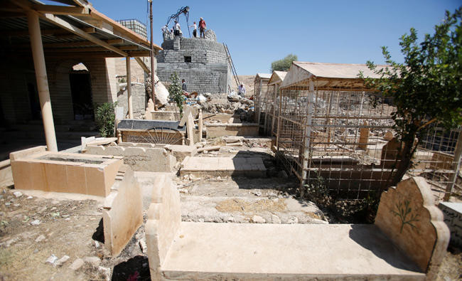 Yazidis rebuild destroyed shrine in Iraqi city