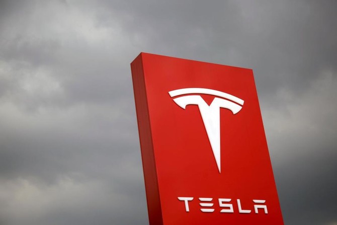 Tesla raises $1.8 billion in first junk bond offering