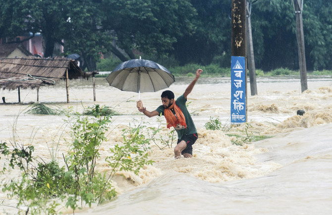 Thousands uprooted as floods kill 143 in India, Nepal