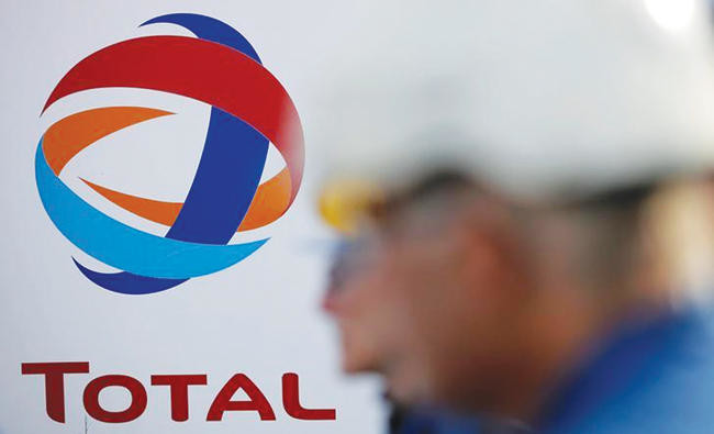 Total set to raise cost savings target after Maersk Oil deal