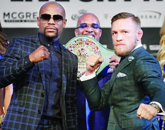 Mayweather, McGregor get down to business