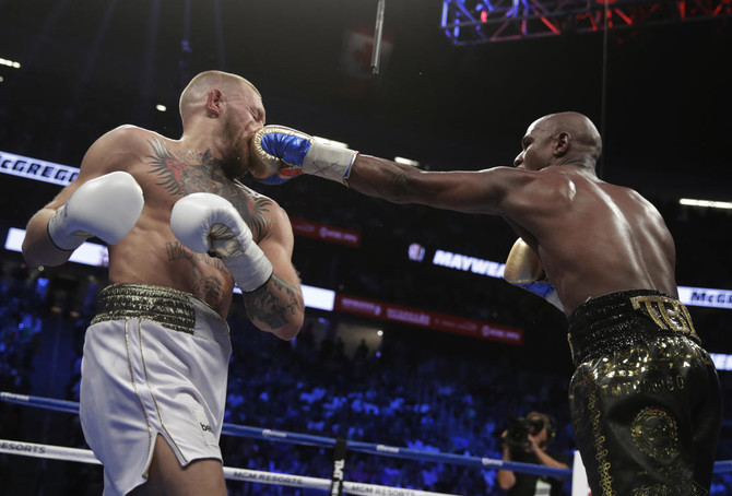 Watch: Mayweather, McGregor hug it out after superfight