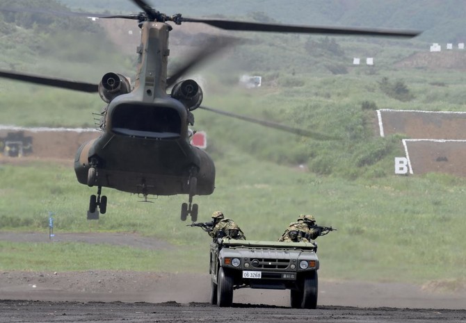 Three missing after Japan military helicopter loses contact over Sea of Japan