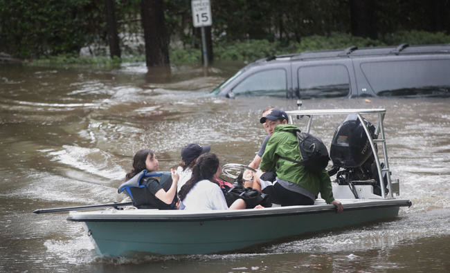 Catastrophic floods strike Houston; thousands flee homes