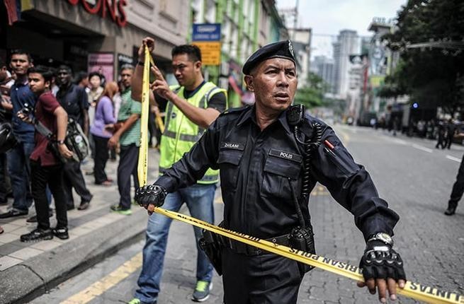 Malaysian police arrest suspected Abu Sayyaf leader, seven others