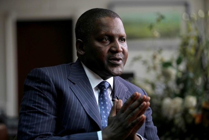 Africa’s richest man joins race for South African cement firm