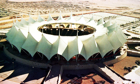 Saudi Arabia allows women into King Fahd stadium to join national day celebrations