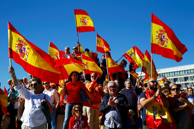 Spaniards take to streets as Catalonia independence tensions rise