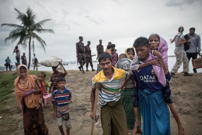 Ten drown as Rohingya boat sinks off Bangladesh, 12,000 more arrive