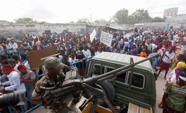 Thousands in Mogadishu march in defiance after attack