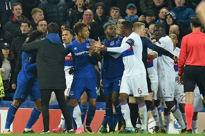 Everton ban fan who attacked Lyon player while holding child