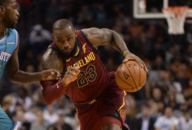 LeBron James scores 31 points, Cavaliers top Hornets 115-107