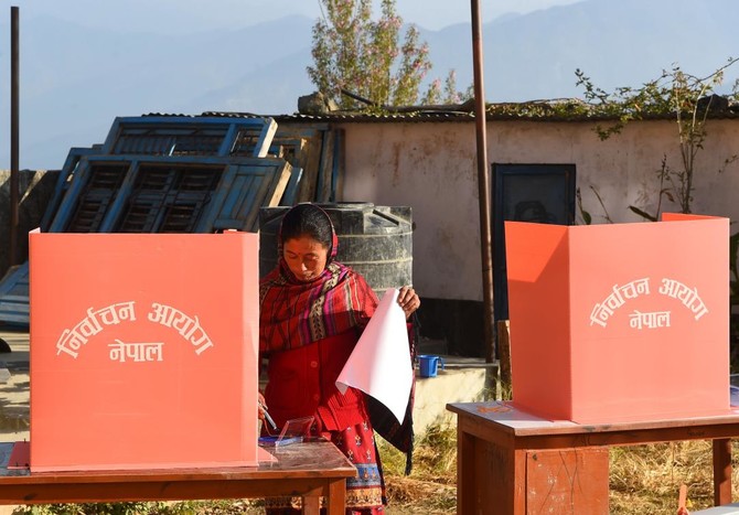 Nepal begins historic vote, army says rogue Maoists behind blasts